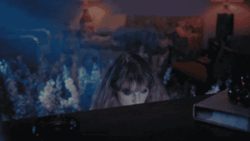 Taylor Swift in a music video from her &quot;Midnights&quot; album