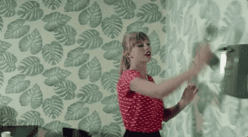 Taylor Swift in a music video on her &quot;Red album