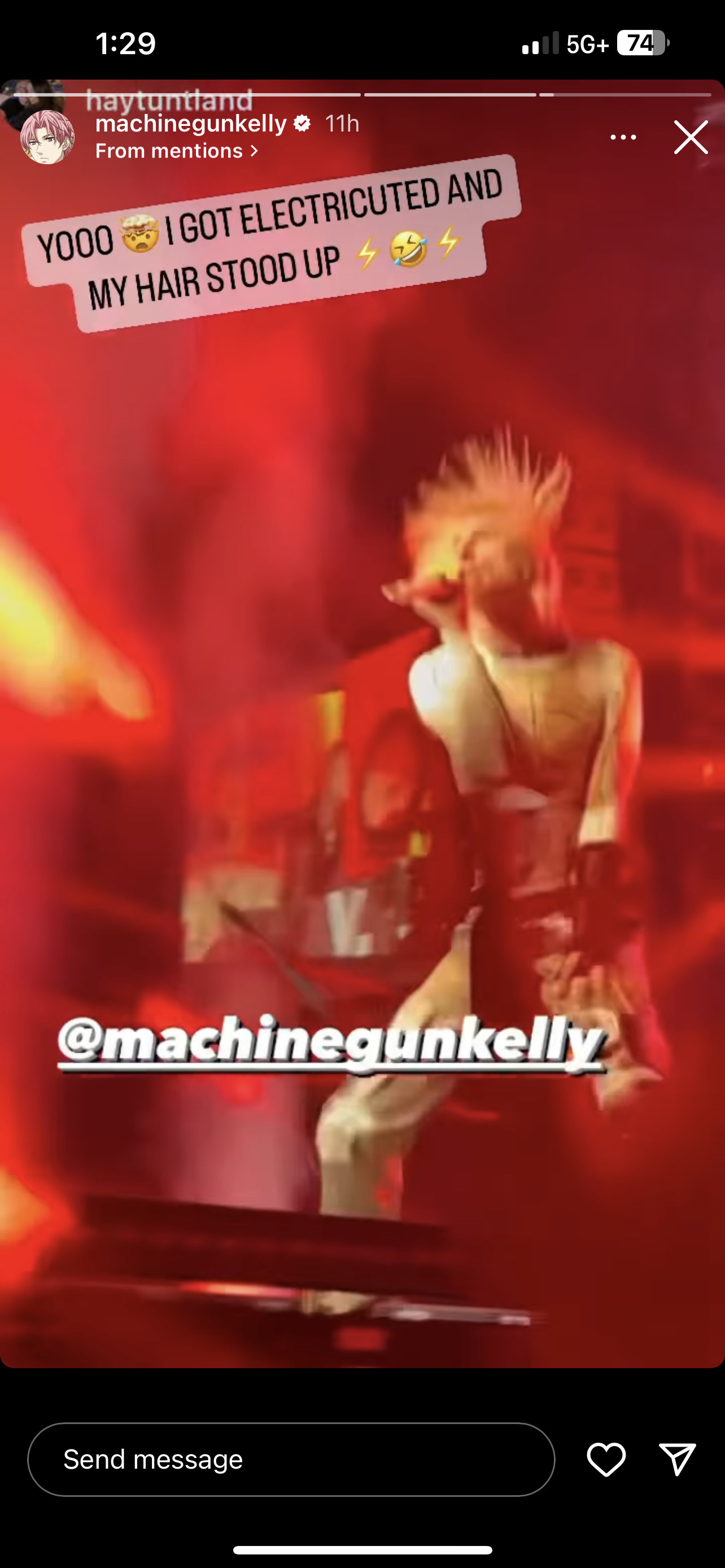 machine gun kelly performing and his hair standing straight up