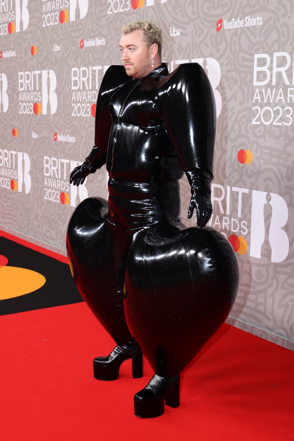 Sam Smith Wears Inflatable Brit Awards Red Carpet Look