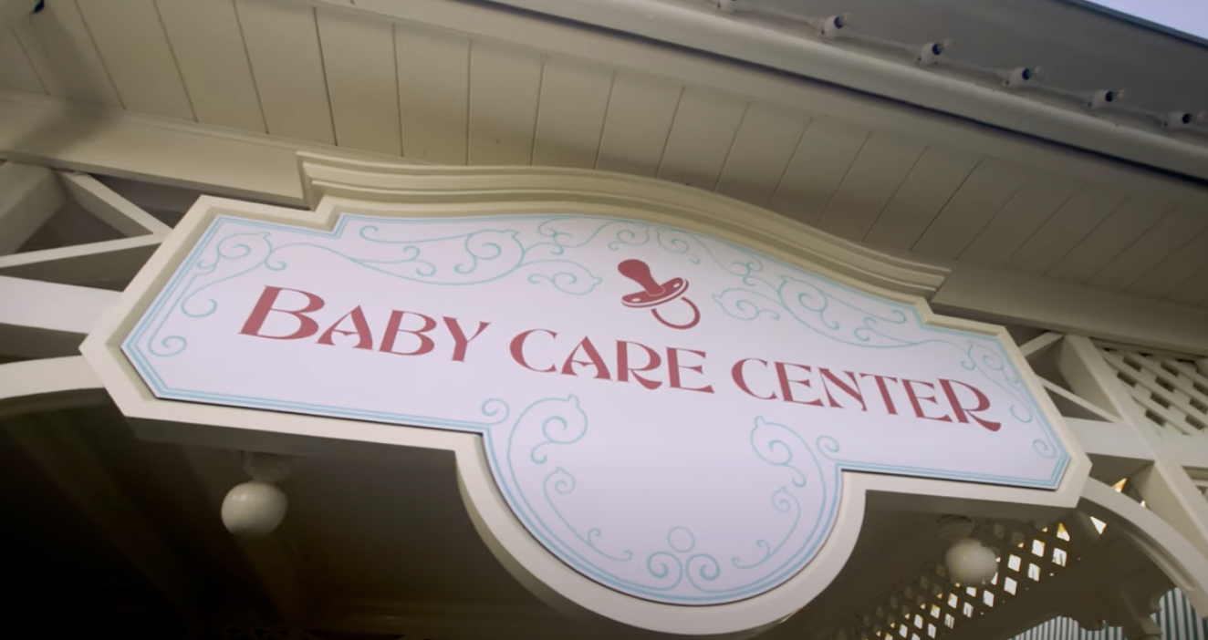 A photo of a baby care center sign