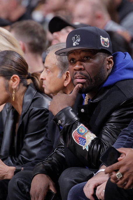 closeup of 50 cent sitting at a game