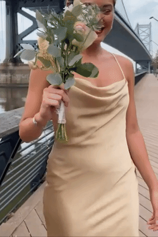 a gif of the maxi dress in beige