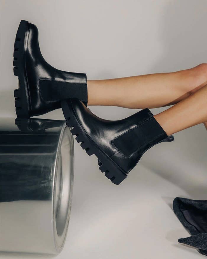model wearing black boots
