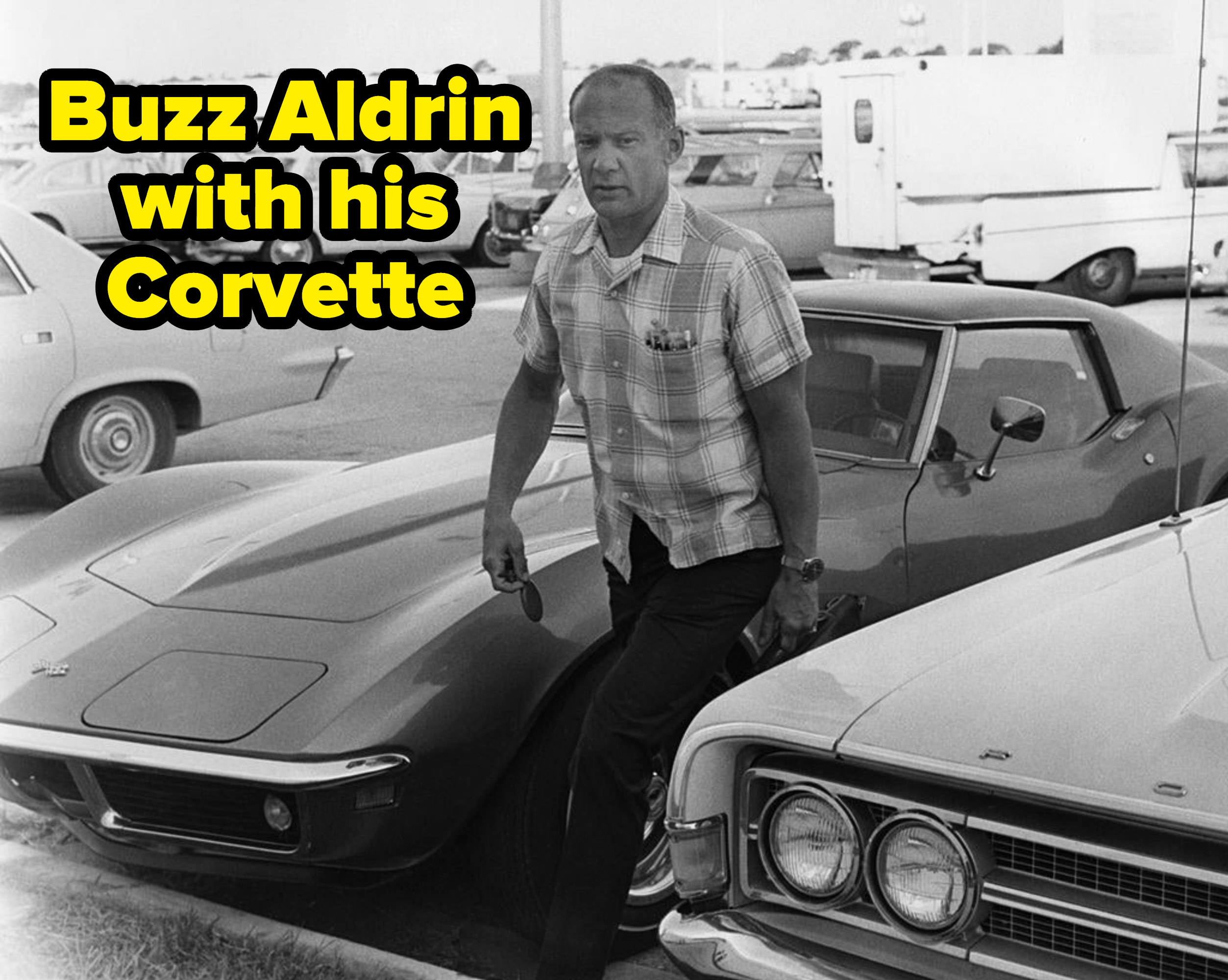 Buzz Aldrin next to his car