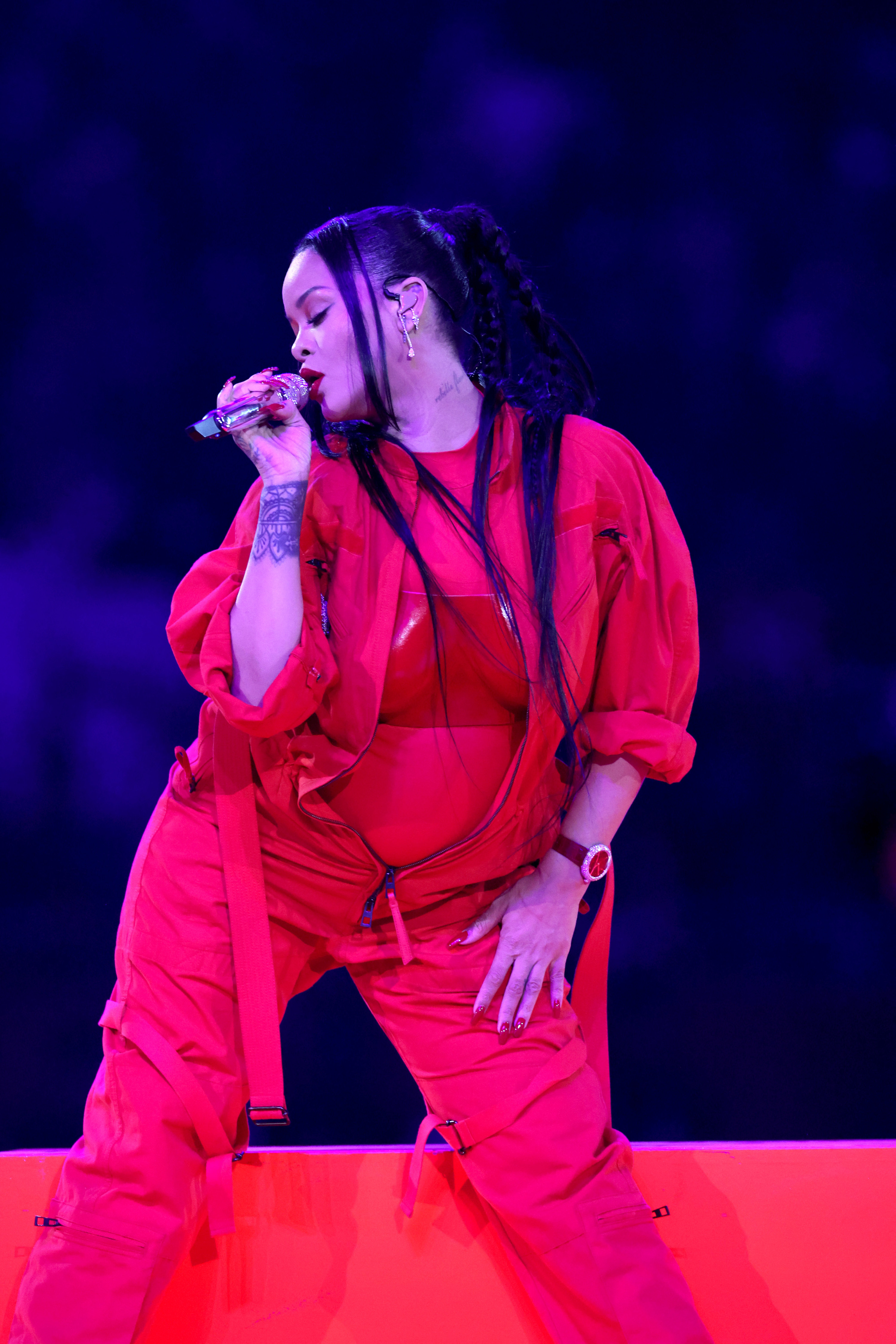 Rihanna fans are convinced she's pregnant after she shows 'bump' during Super  Bowl Halftime performance