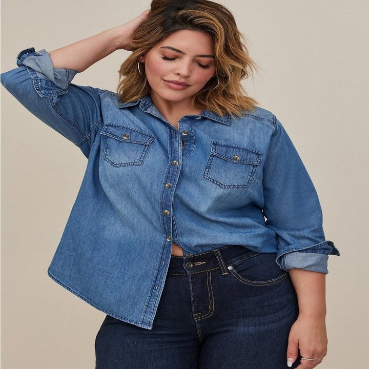 model wearing denim shirt