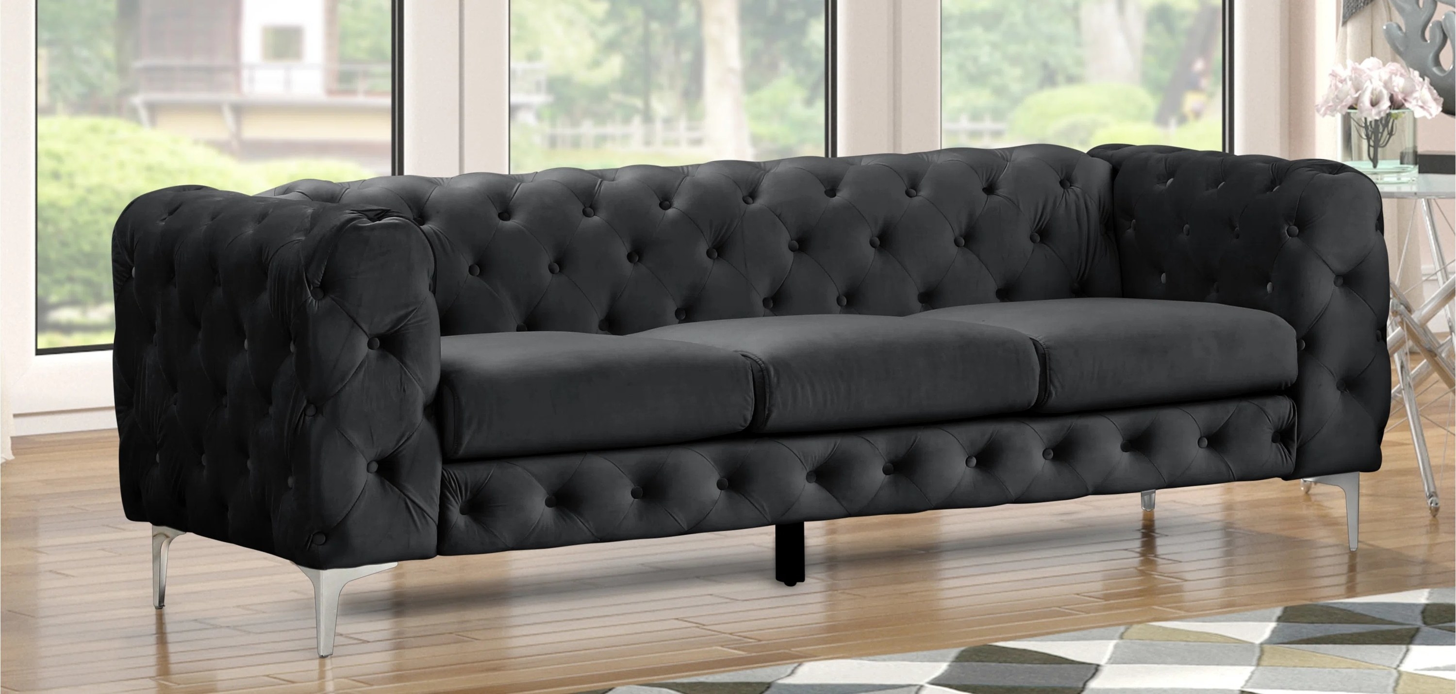 black bubbly tufted couch