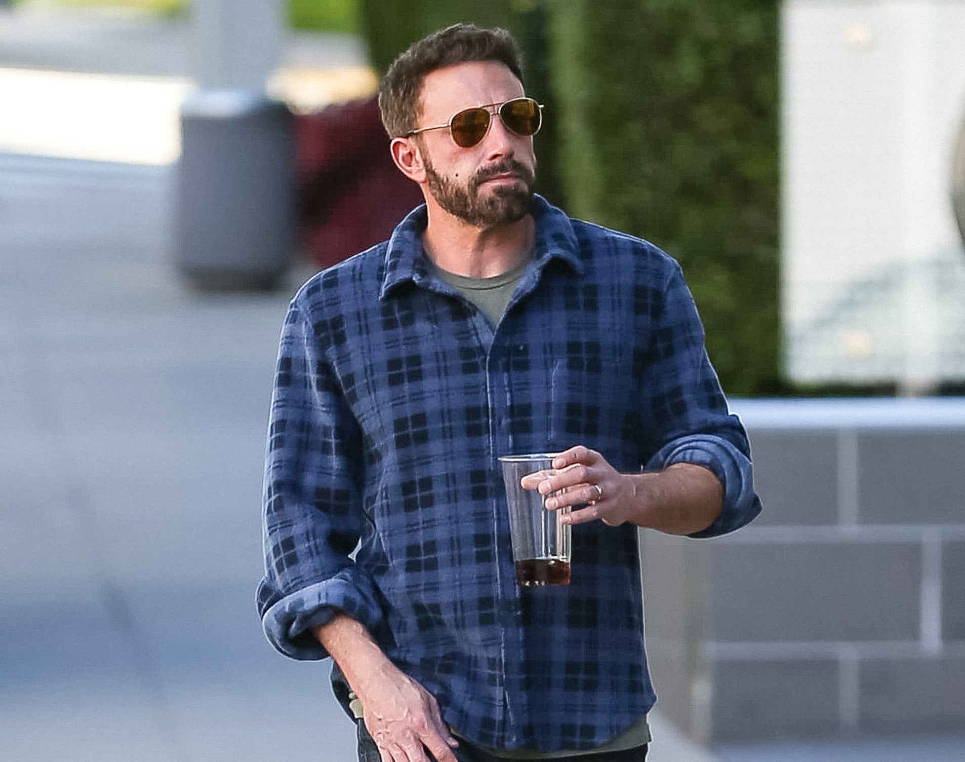 Ben Affleck holding a cup of coffee