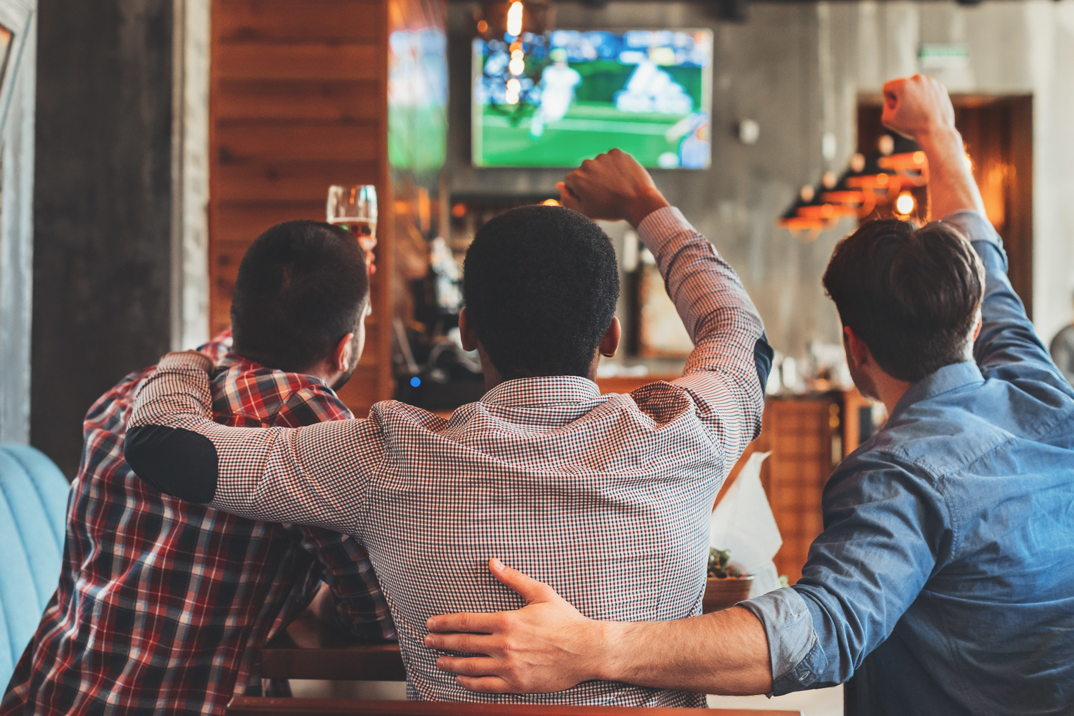Men watching soccer in bar