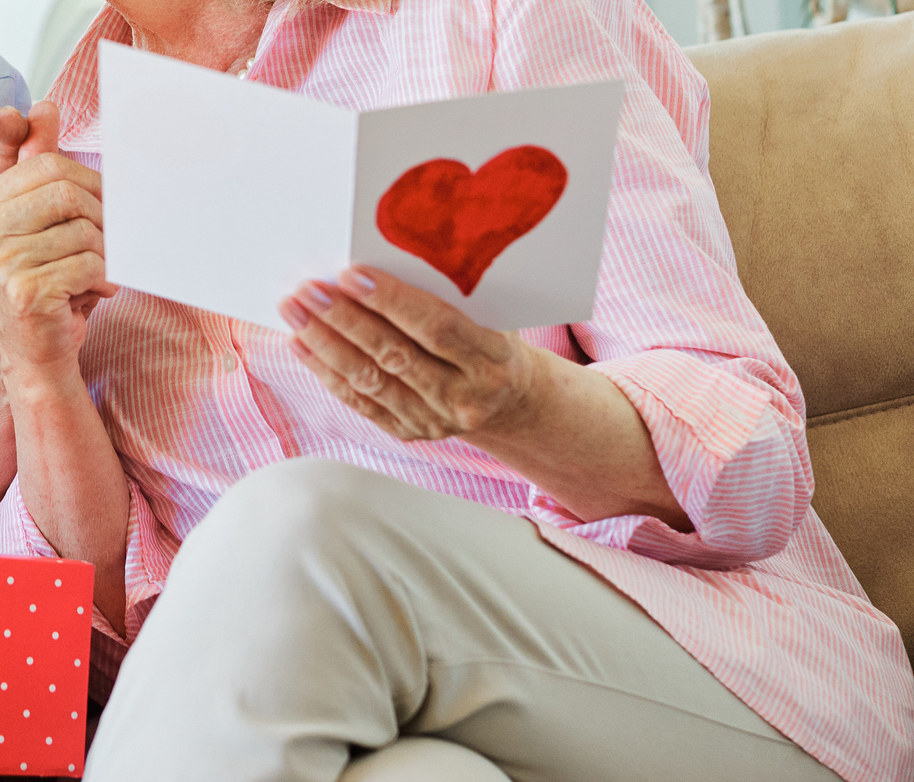 Woman holding valentine's day card