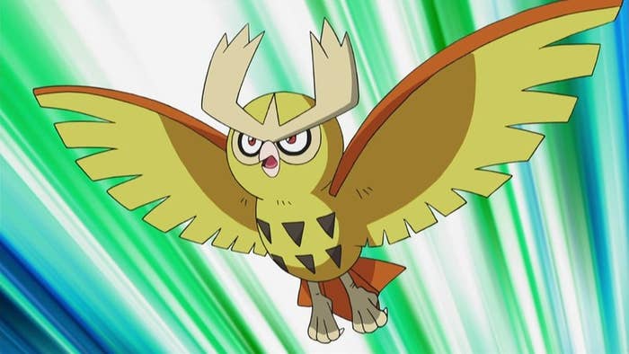 A shiny, yellow Noctowl soars through the air