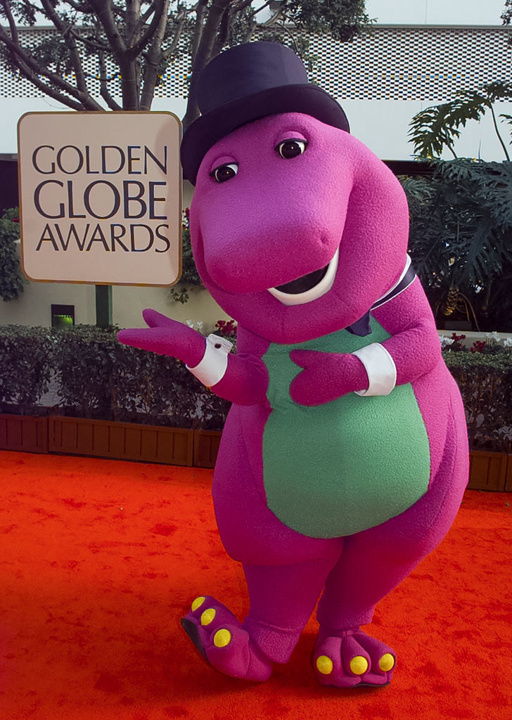 Barney wears a top hat on the Golden Globes Awards red carpet
