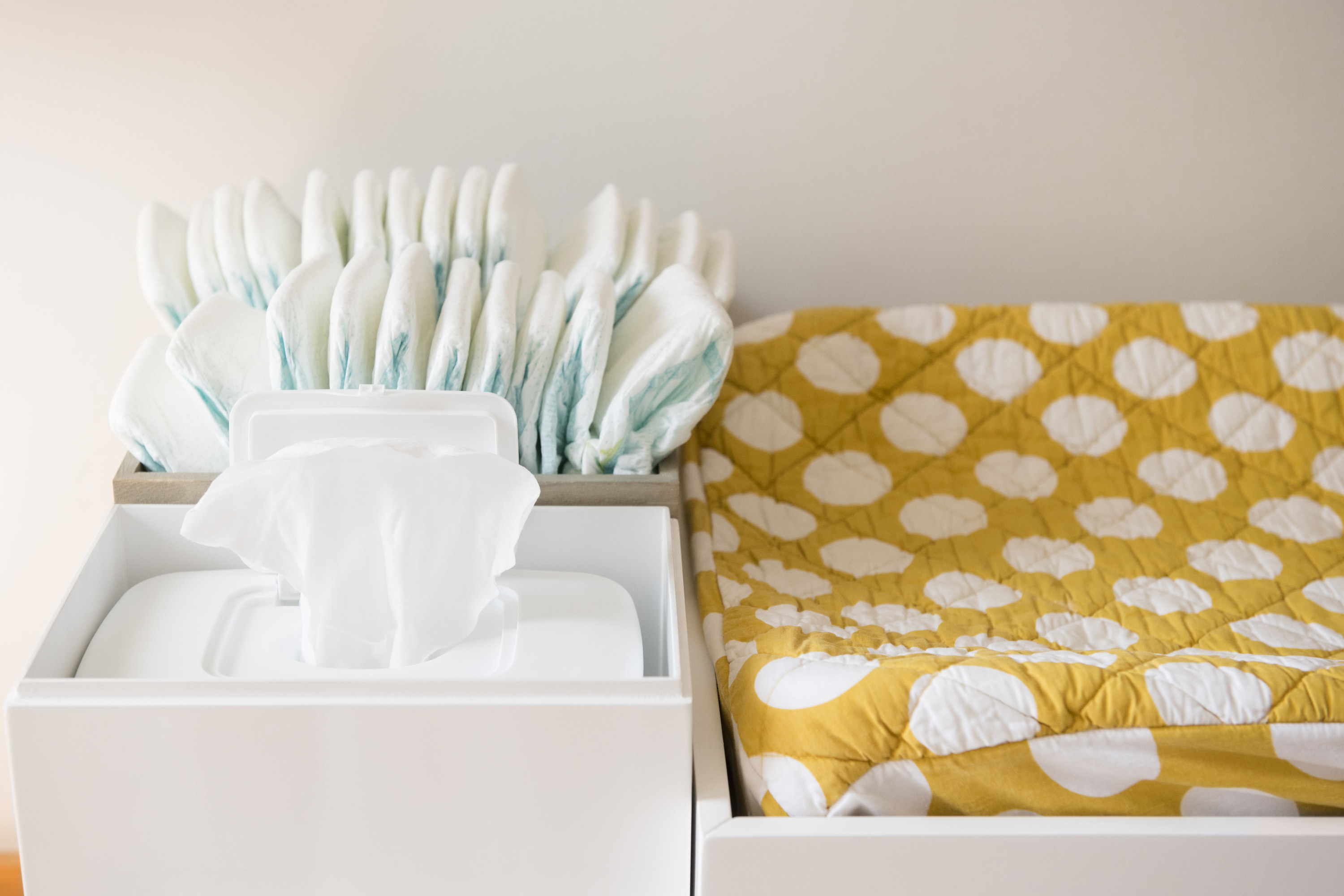 baby wipes next to the changing table