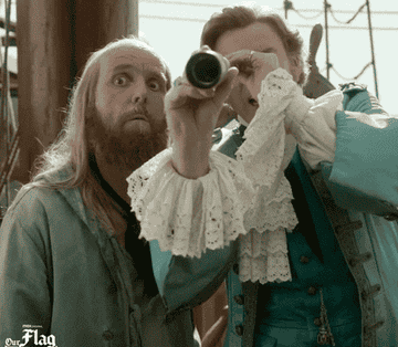 a gif of two pirates from our flag means death looking through a telescope