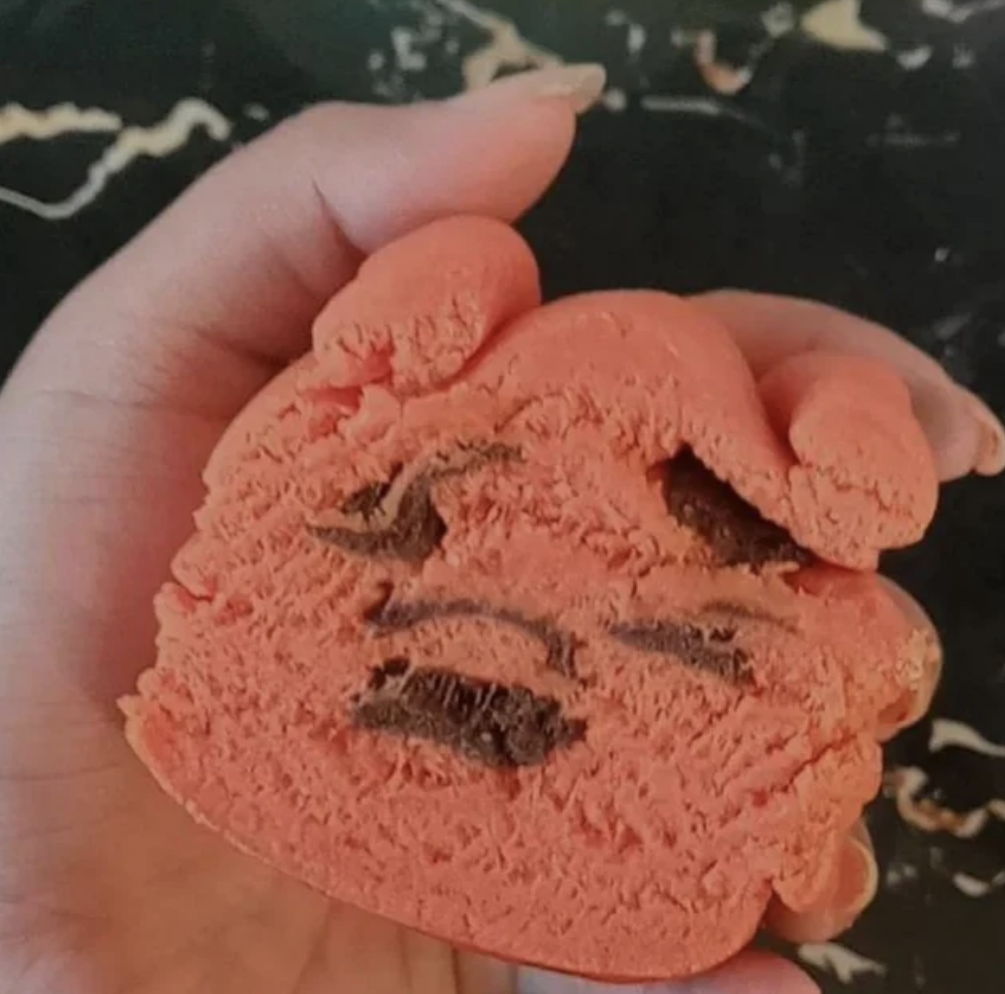 A cookie shaped like Winnie-the-Pooh