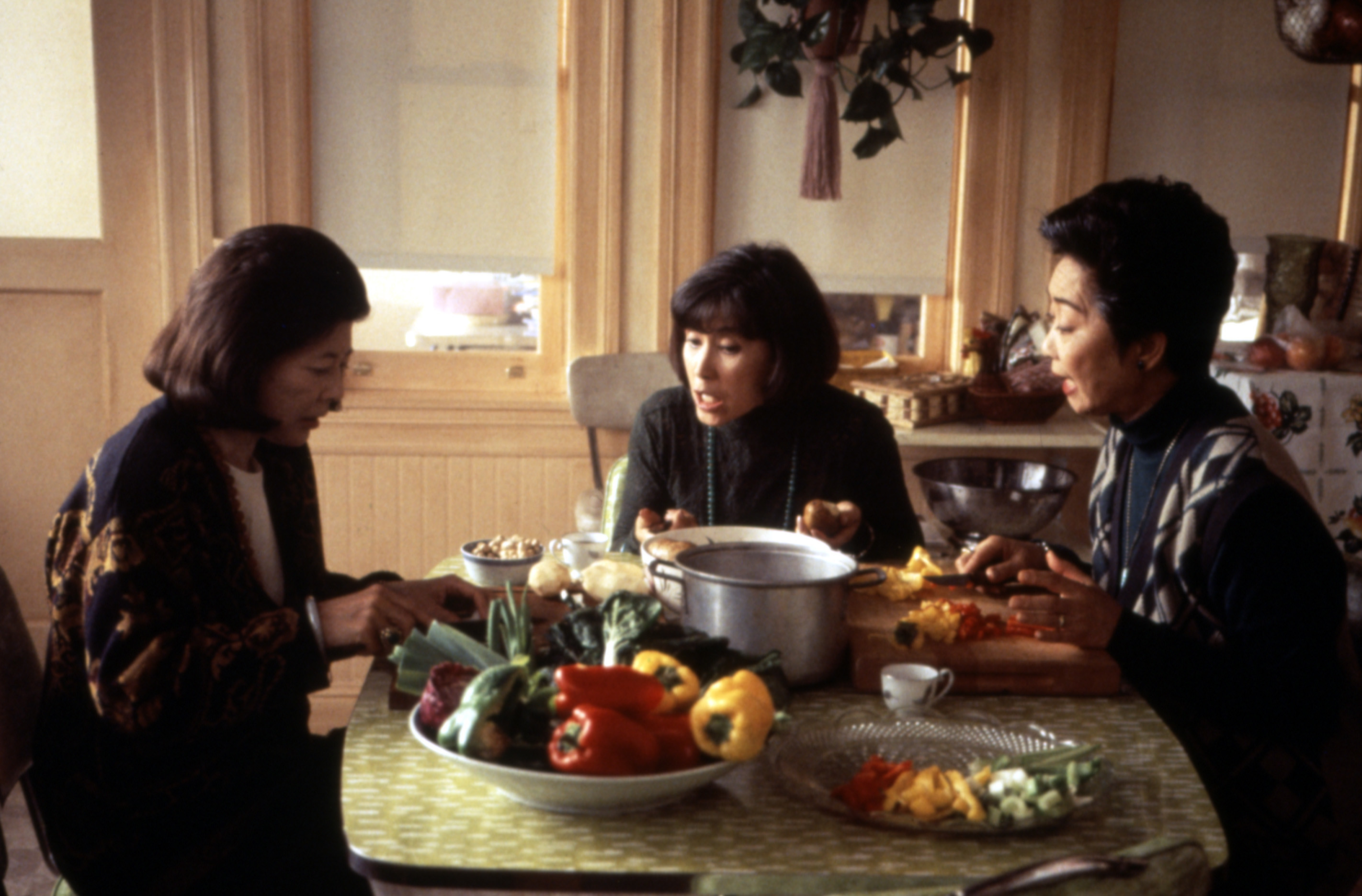 three generations of women at a dining table