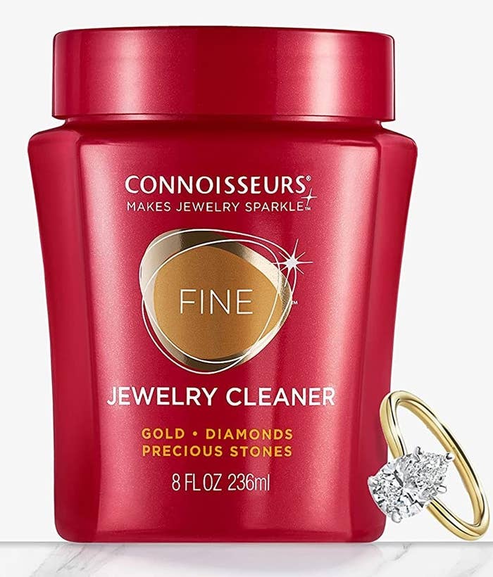 the jewellery cleaner next to a ring