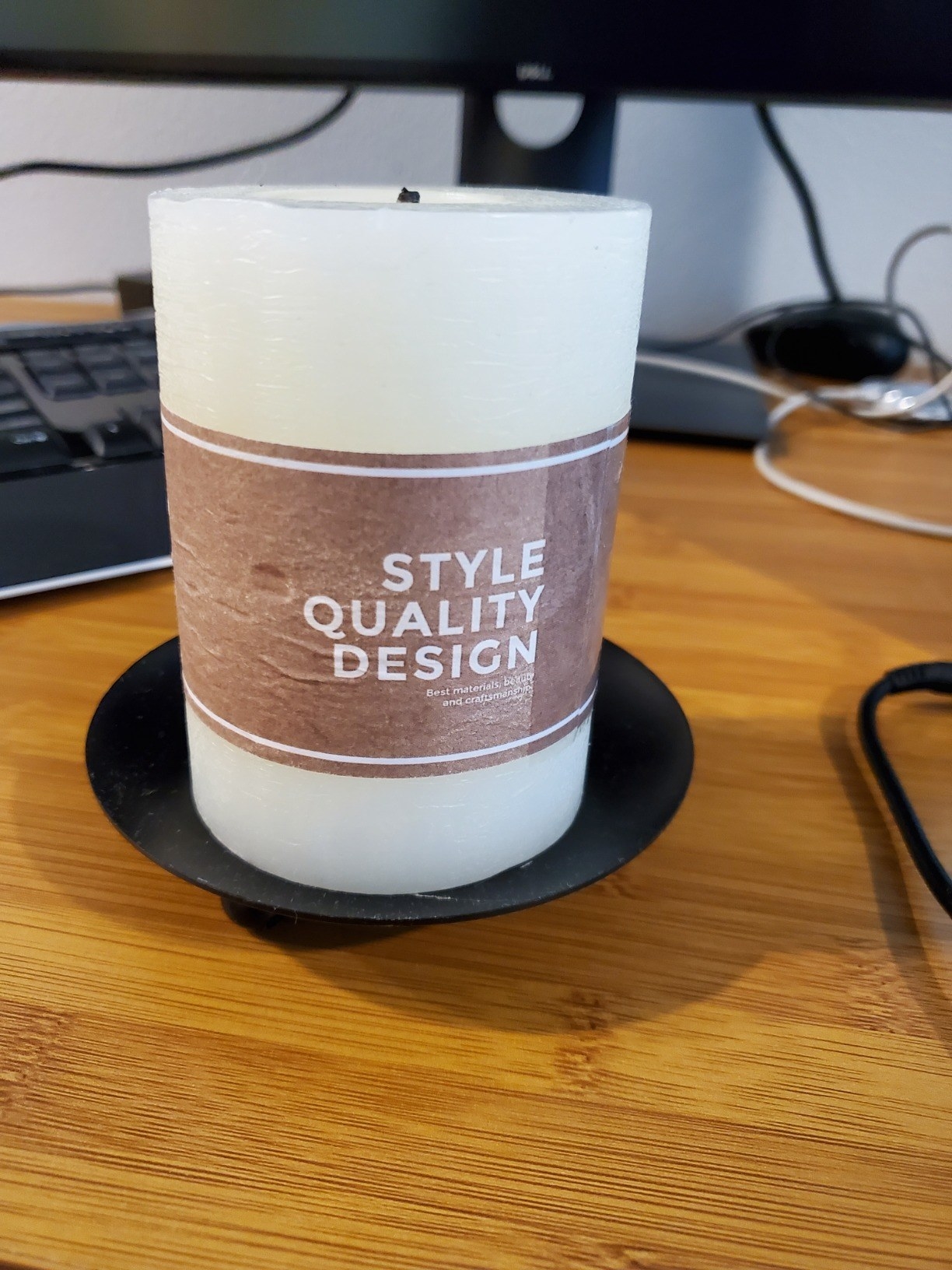 a reviewer&#x27;s candle holder in black
