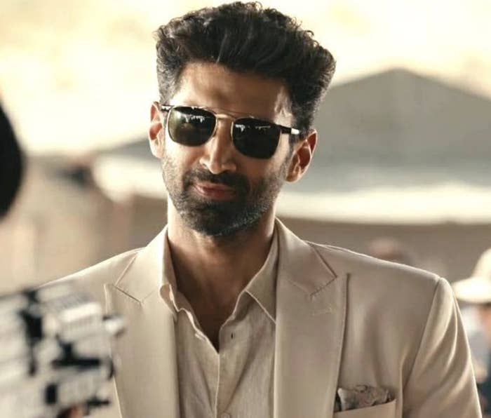 Aditya Roy Kapur wearing sunglasses in a still from the show