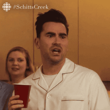 David Rose from &quot;Schitt&#x27;s Creek&quot; drinking from a red solo cup and saying, &quot;you&#x27;re a bitch&quot;