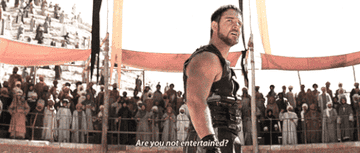 A scene from the movie The Gladiator with the caption &quot;Are you not entertained?&quot;