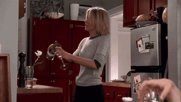 Meg Ryan pouring herself a drink in &quot;Kate &amp;amp; Leopold&quot;