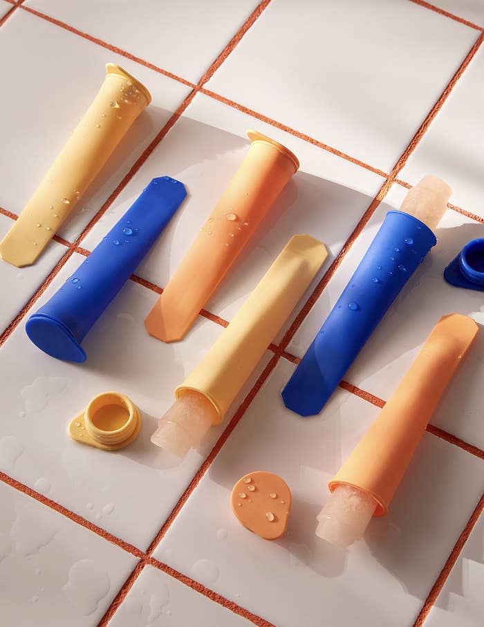 the ice pop moulds on a ceramic tile countertop