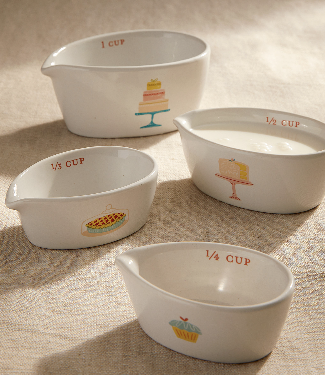 the measuring cups on a burlap table cloth