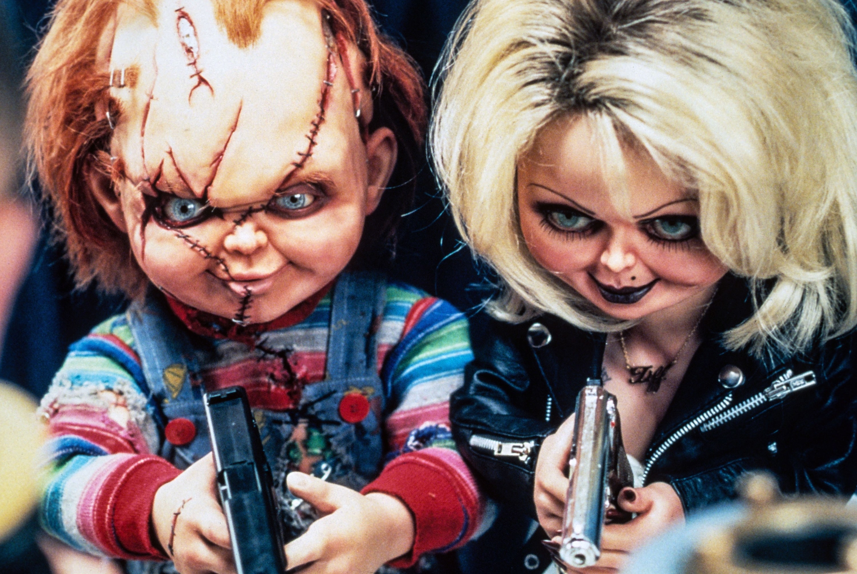chucky and tiffany with guns in bride of chucky