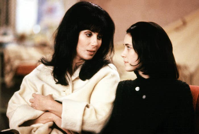 Cher looks down as Rachel while Winona Ryder looks up to her as Charlotte