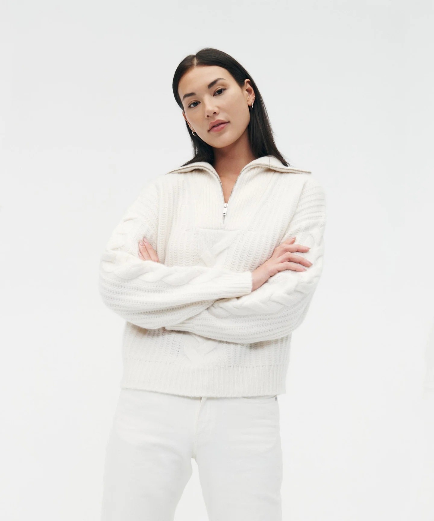 model wearing white cashmere cable quarter zip