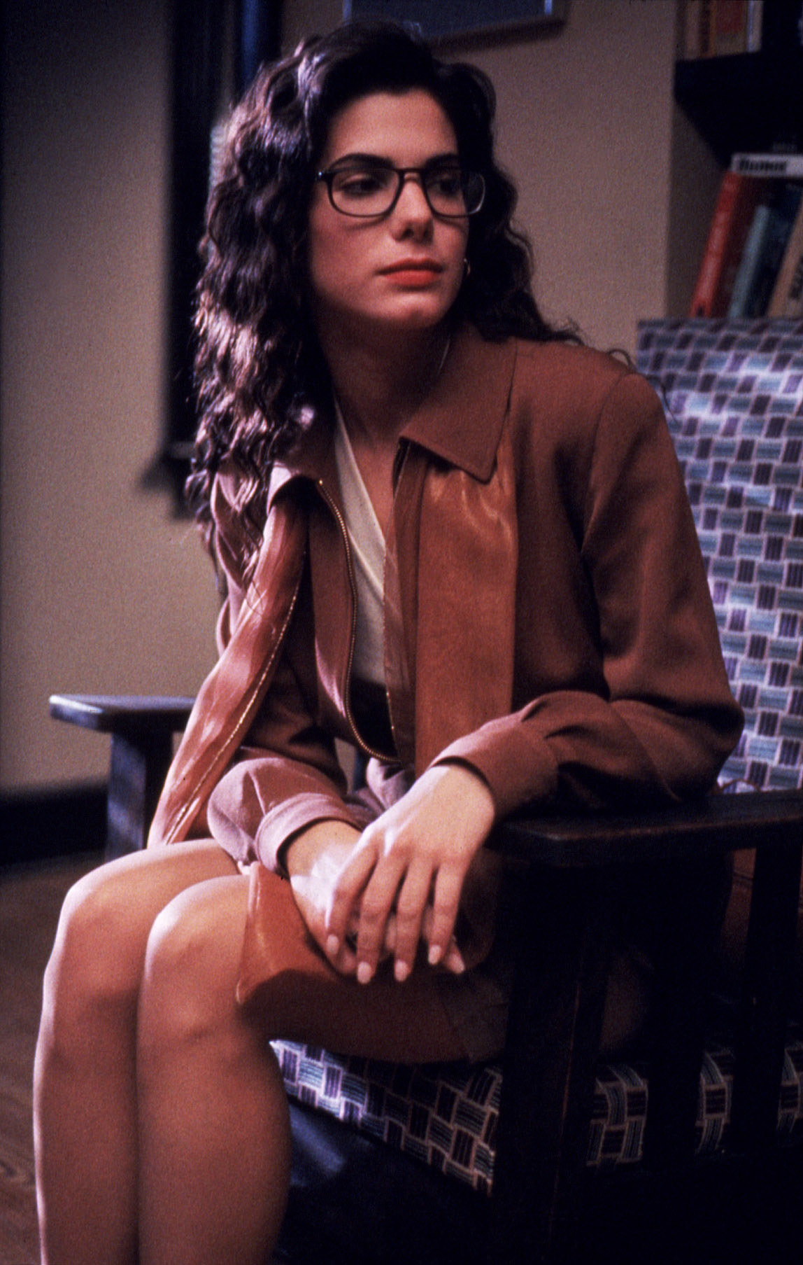 closeup of sandra sitting in a chair for the film