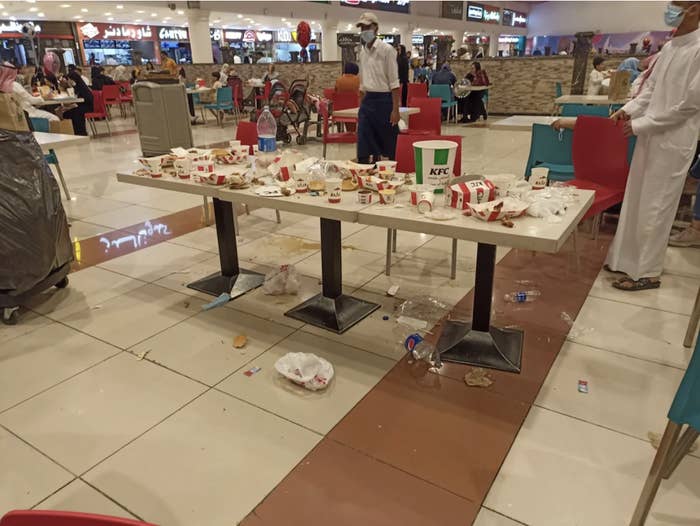 A messy table at the food court