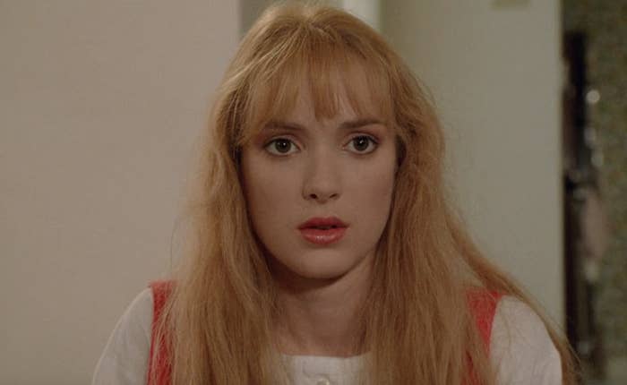 Winona Ryder stares ahead, watching intently, as Kim