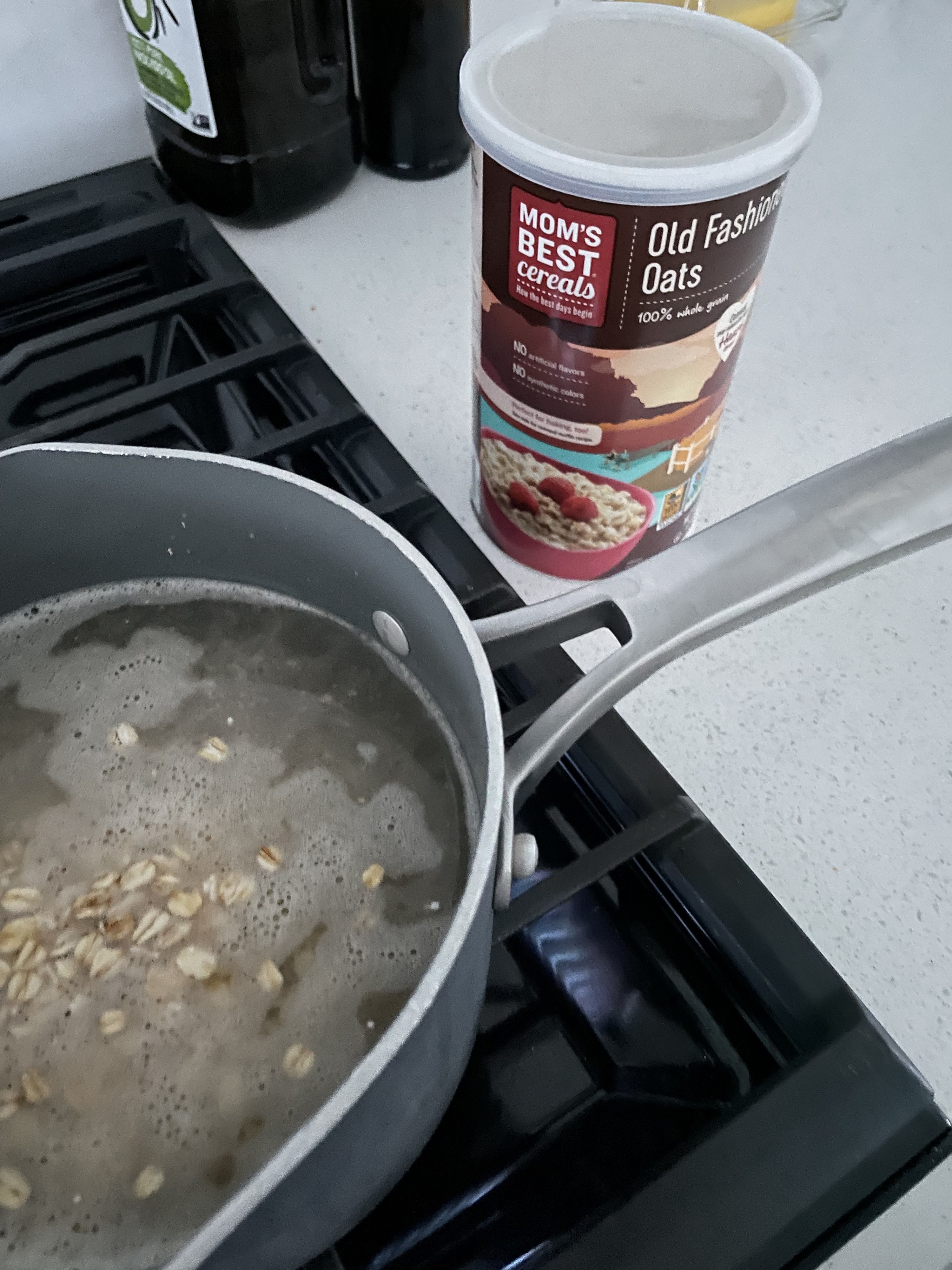 a pot of oatmeal cooking on the stove