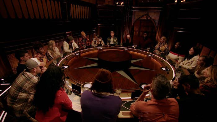 The cast of The Traitors sit around the Round Table