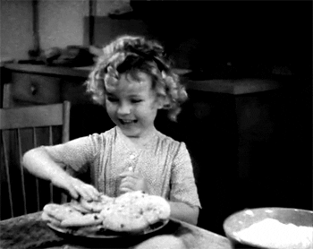Shirley Temple steals a cookie