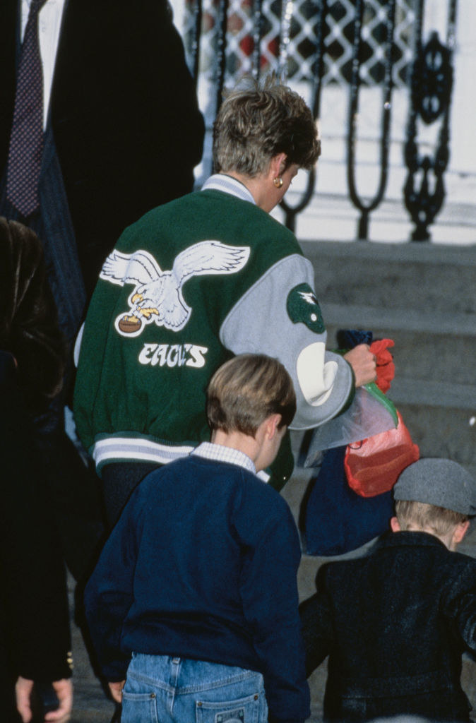 princess diana wearing the jacket while walking with her kids