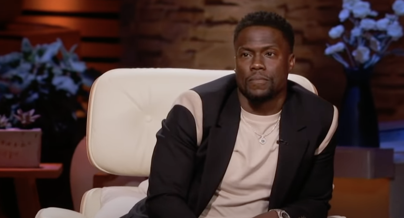 Kevin Hart looks on