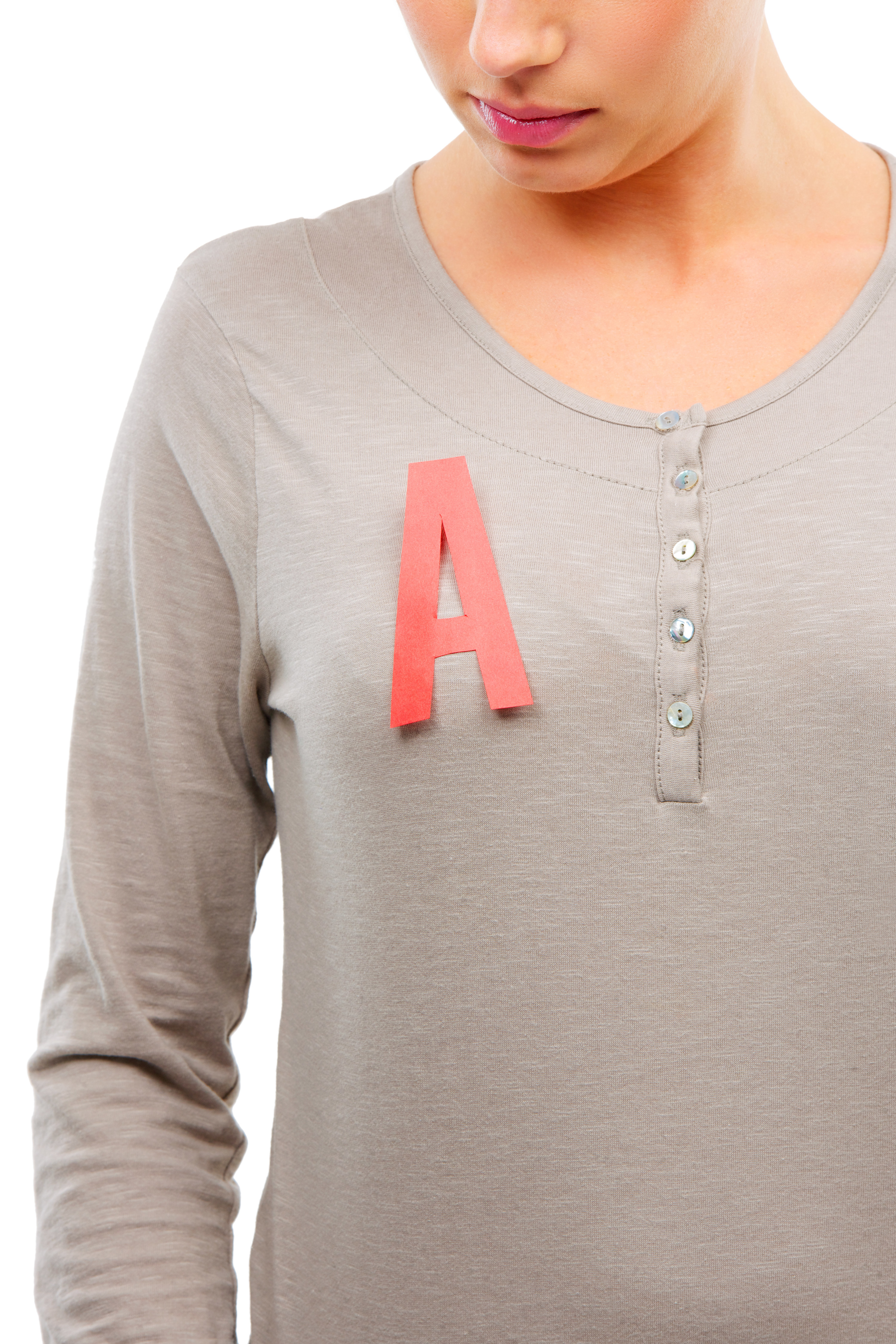 A woman with a red letter A on her shirt