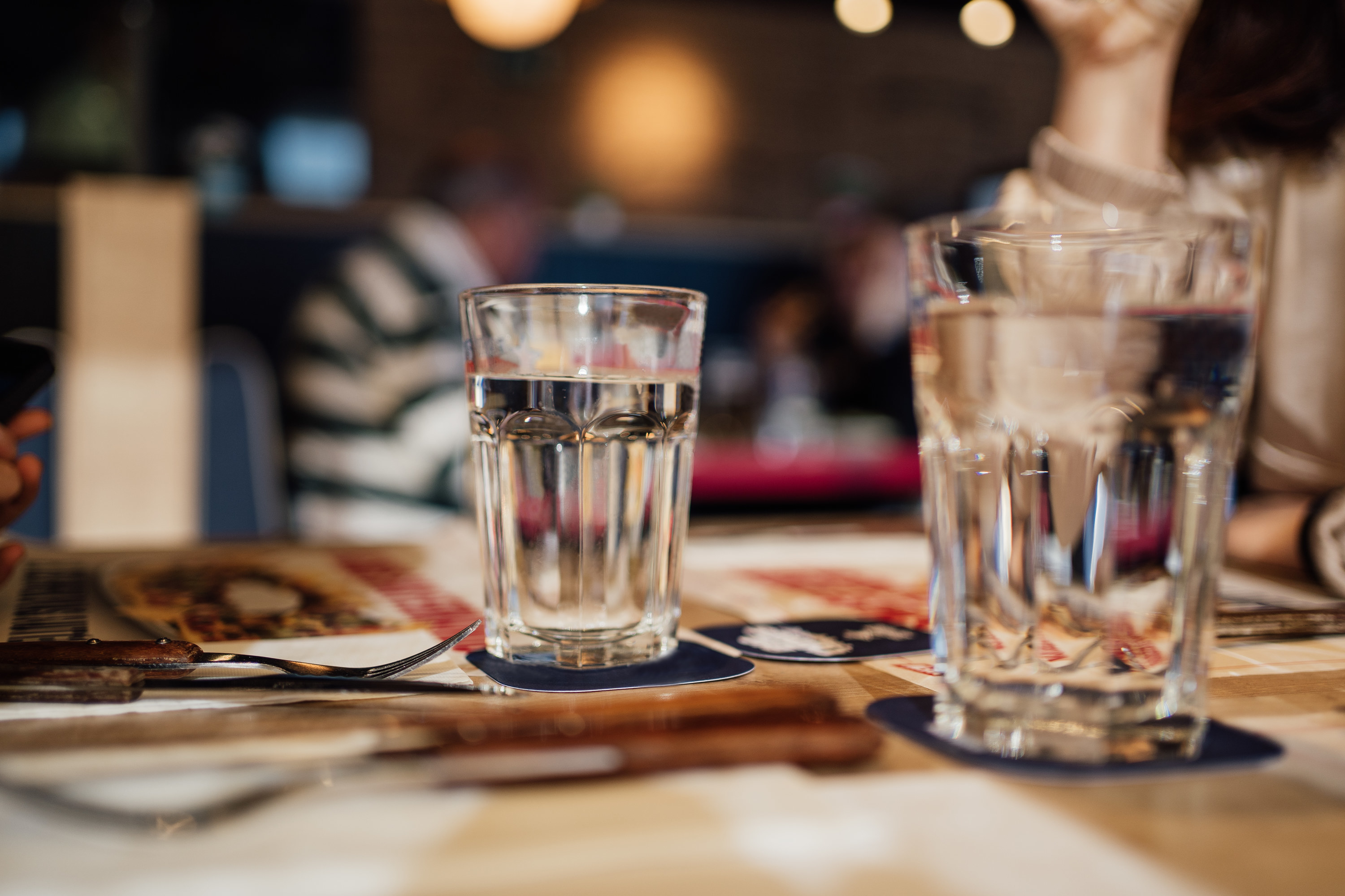 place settings and cups on a table