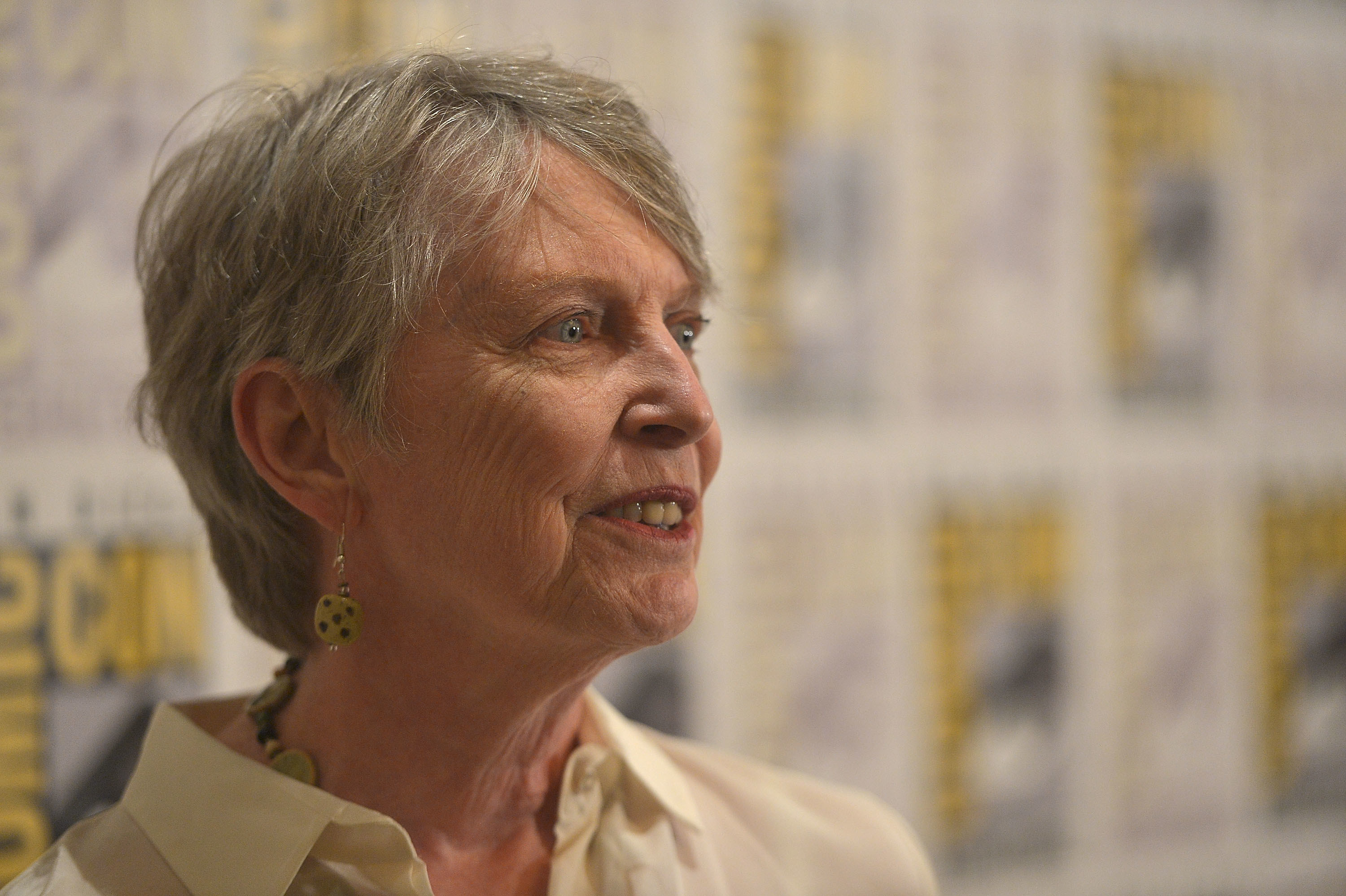 Lois Lowry posing on a red carpet