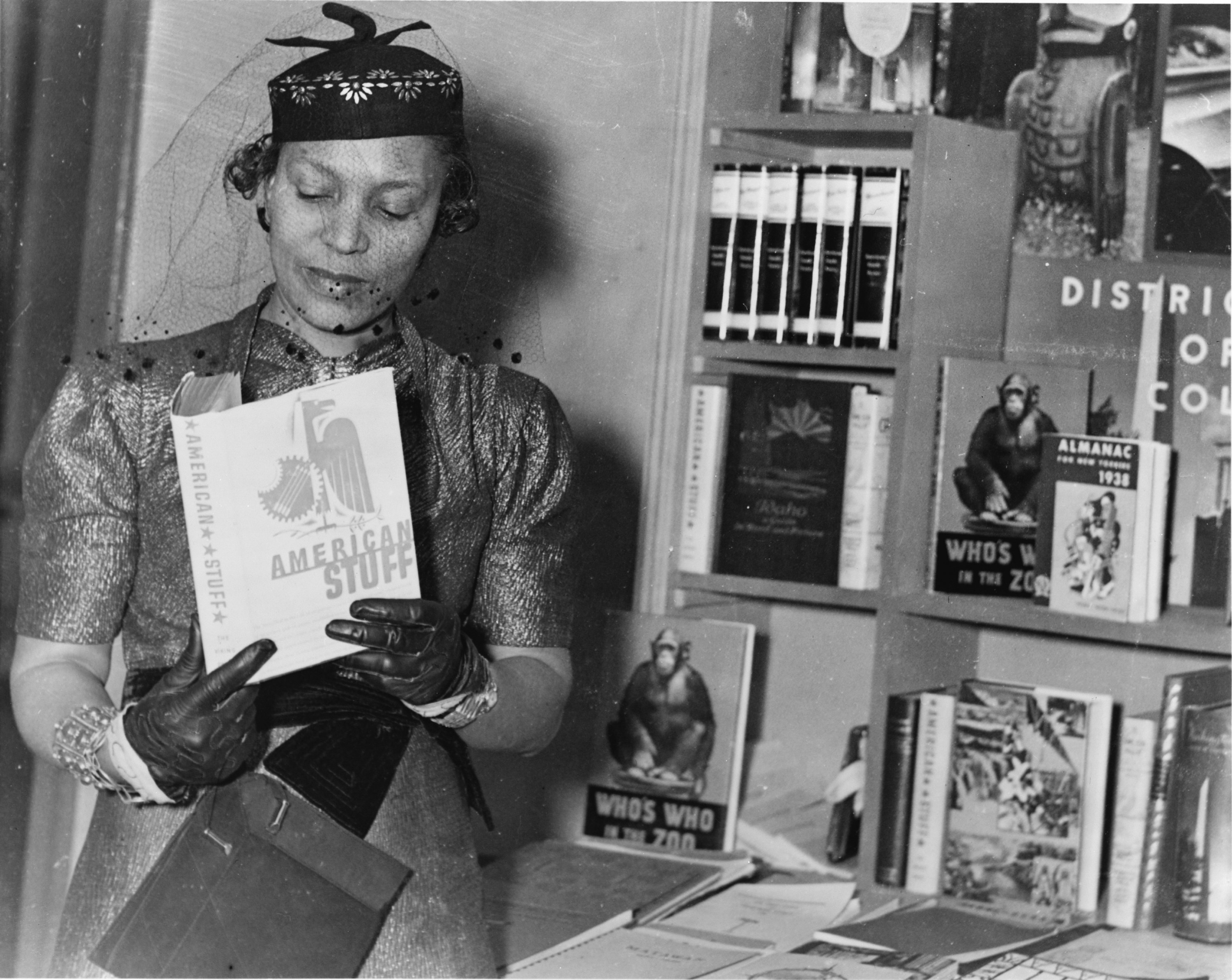 Zora Neale Hurston holding a book
