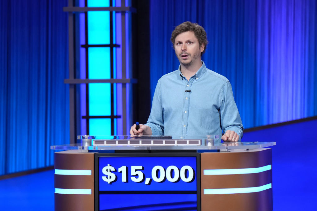 Cera behind the jeopardy stand