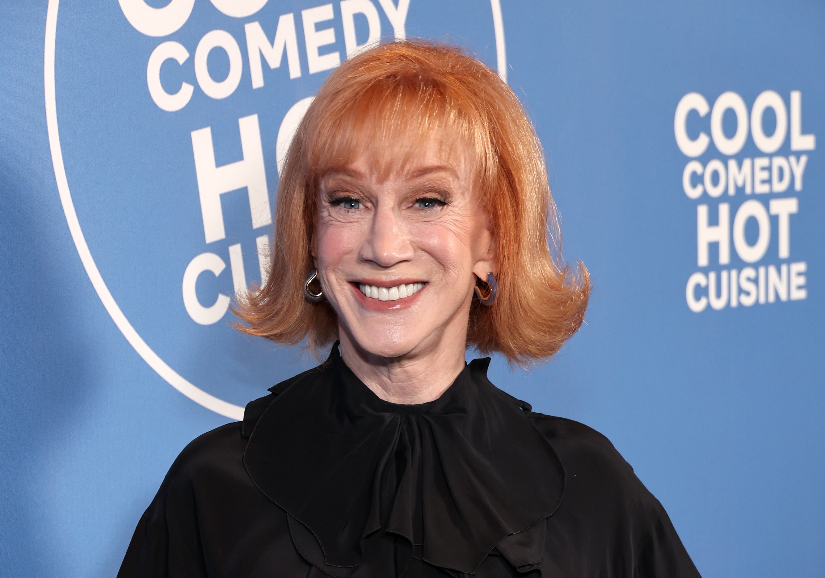 kathy griffin smiling in a black dress