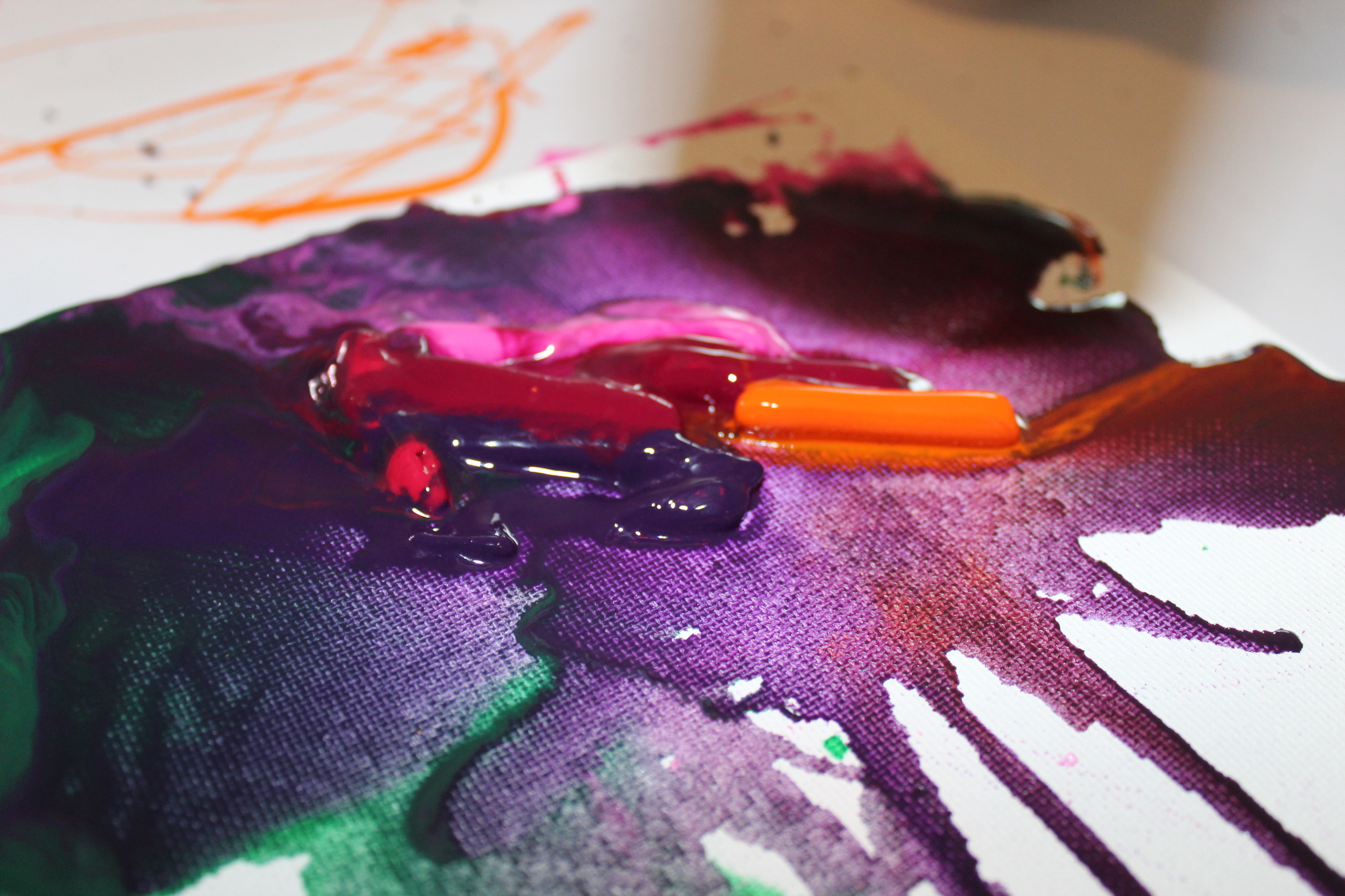 melting crayons on canvas