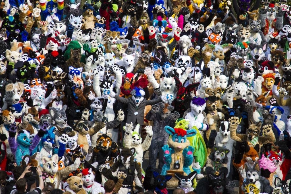 Delegates to the Eurofurence, &quot;Europe&#x27;s biggest furry convention&quot; pose for a picture in front of the conference hotel in Berlin