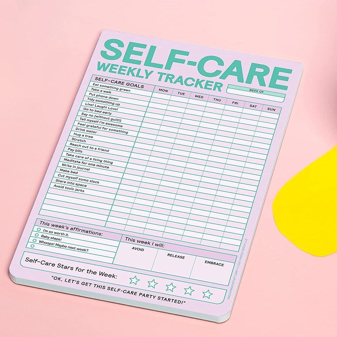 a self care weekly tracker pad