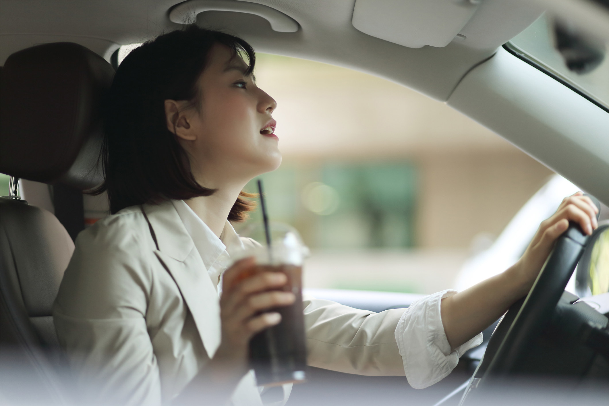 asian woman driving